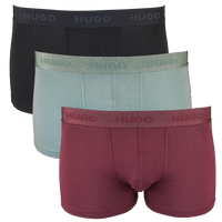 Three pairs of Hugo boxer briefs in black, green, and red on a white background.
