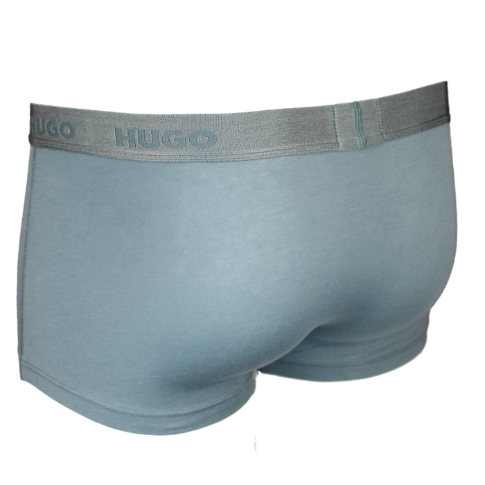 Green men's underwear with 'Hugo' brand label on a white background