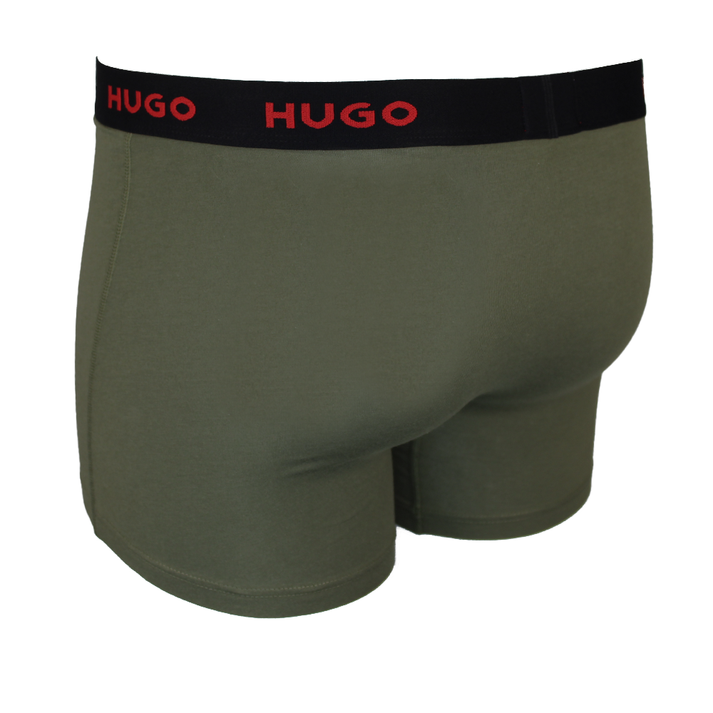 Green boxer briefs with black waistband featuring 'HUGO' branding on a white background.