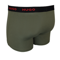 Green boxer briefs with black waistband featuring 'HUGO' branding on a white background.