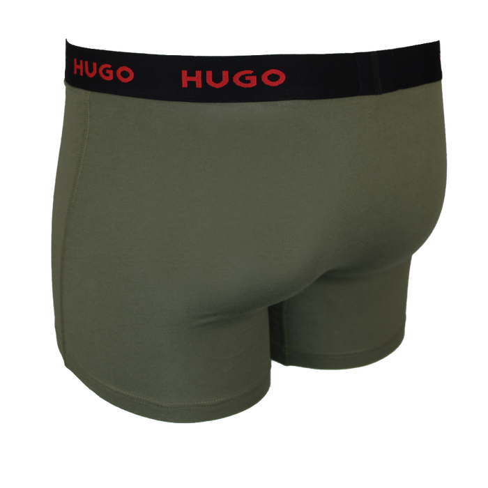 Green boxer briefs with black waistband featuring 'HUGO' branding on a white background.