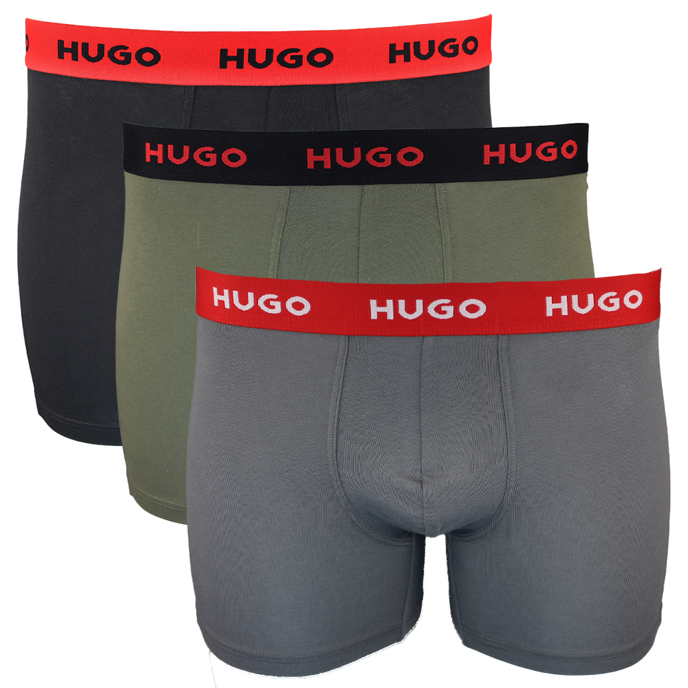 Three pairs of Hugo boxer briefs with different waistband colors on a white background.