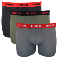 Three pairs of Hugo boxer briefs with different waistband colors on a white background.