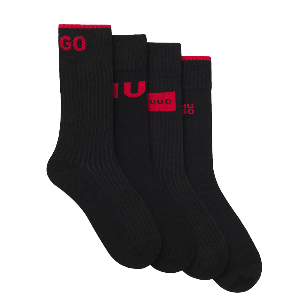 Set of black socks with red branding on a white background