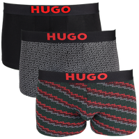 Three pairs of Hugo boxer trunks in different patterns on a white background
