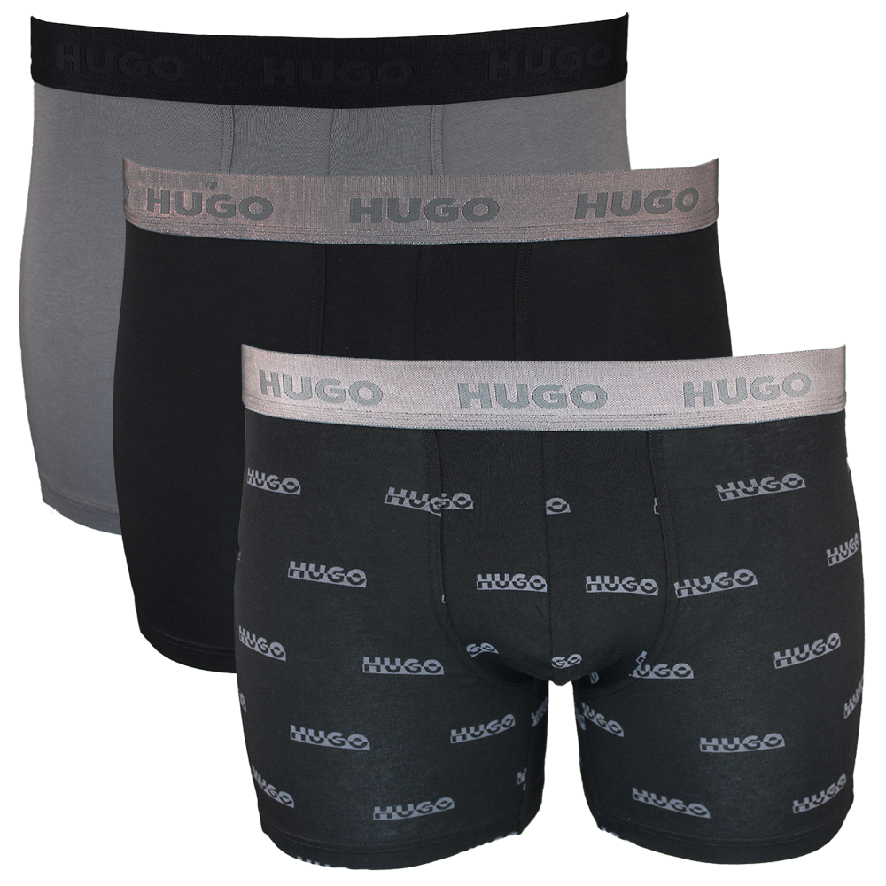 Three pairs of Hugo boxer briefs in black and gray on a white background