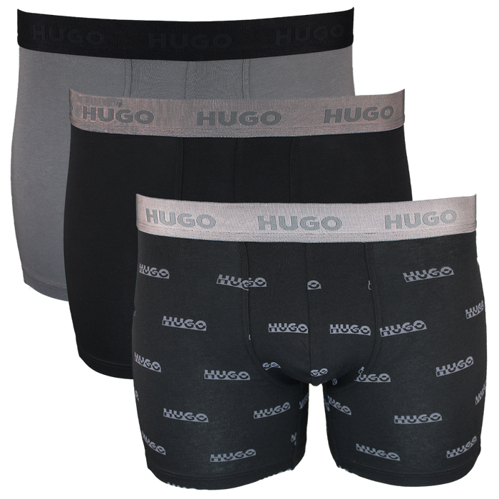 Three pairs of Hugo boxer briefs in black and gray on a white background