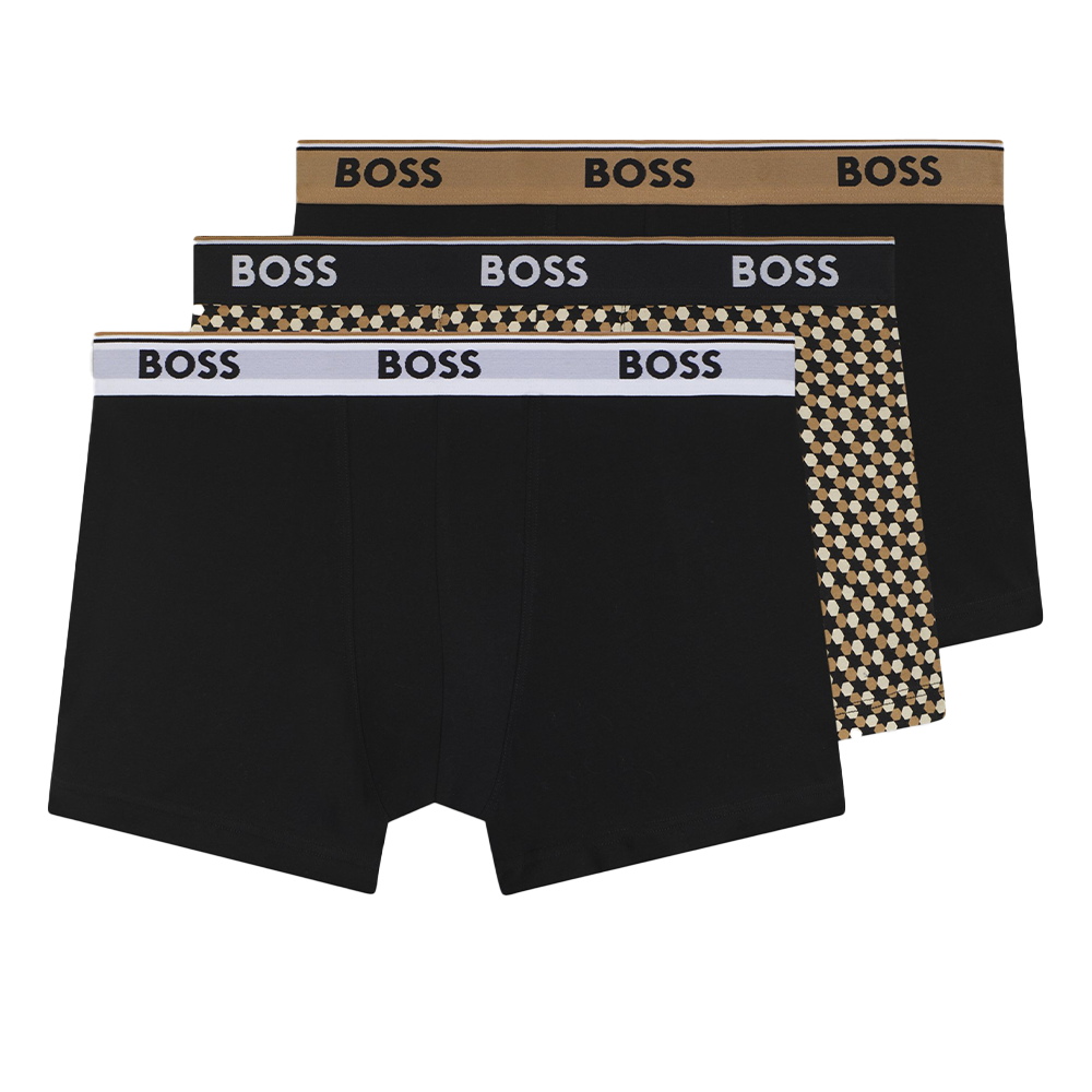 Three black boxer trunks with 'BOSS' branding on packaging against a white background