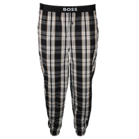Plaid pajama pants with 'BOSS' waistband on a white background