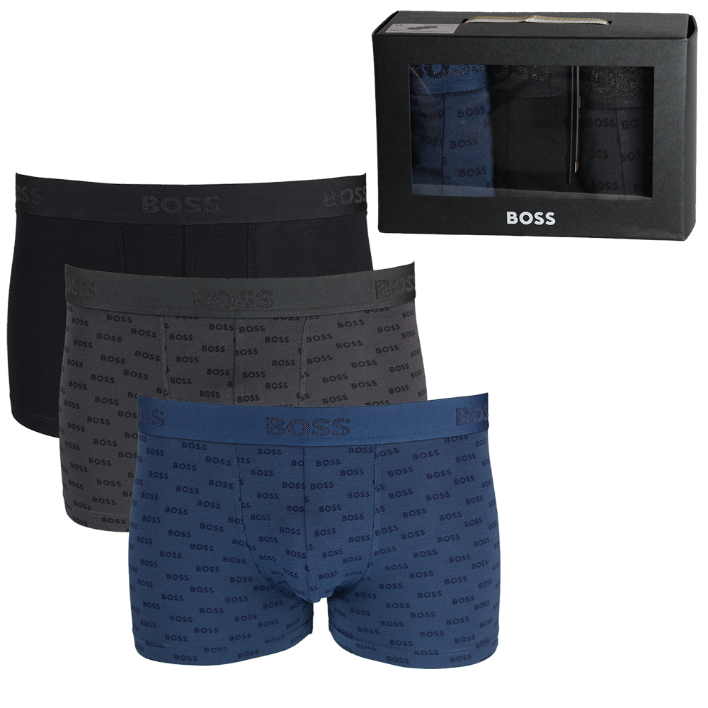 Three pairs of BOSS branded boxer briefs with a black box in the background.