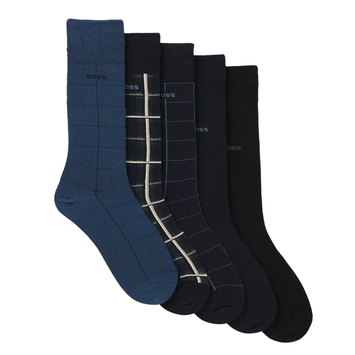 Set of five socks in blue and black with grid patterns on a white background