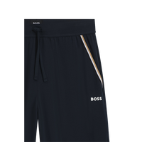 Black pants with a white stripe and 'BOSS' branding on a white background