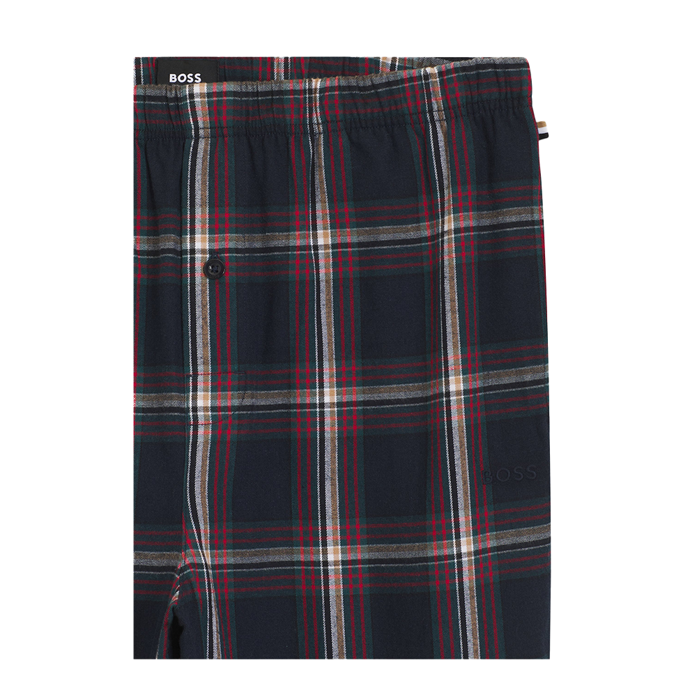 Plaid blue patterned pyjama trousers detail of branding