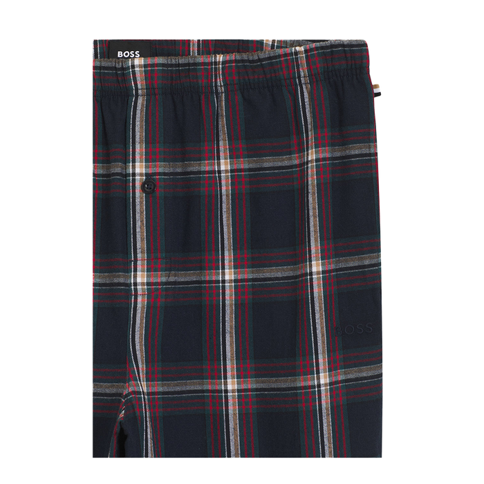 Plaid blue patterned pyjama trousers detail of branding