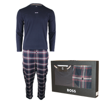 Navy long-sleeve shirt and plaid pants with BOSS packaging on a white background