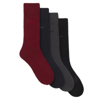 Set of four socks in red, black, and gray on a white background