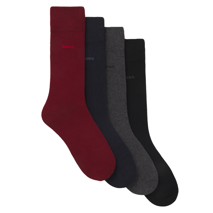 Set of four socks in red, black, and gray on a white background