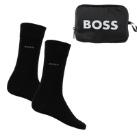 Two black socks and a black pouch with 'BOSS' branding on a white background