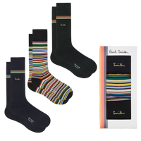 Set of black and multicolored striped socks with packaging on a white background