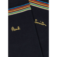 Black socks with rainbow stripes and embroidered names on a white background