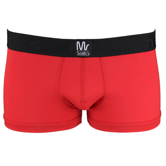 Red boxer trunks with a black waistband on a white background