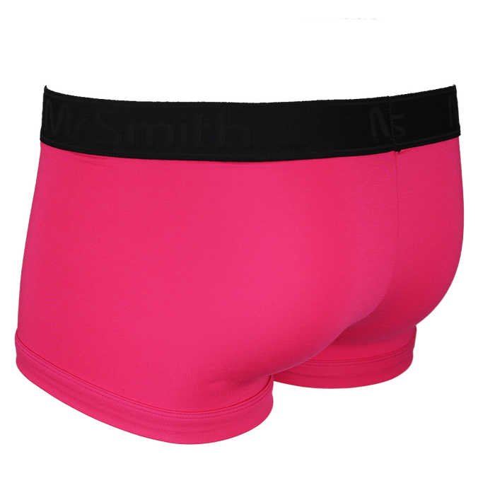 Back view of pink boxer trunks with a black waistband on a white background
