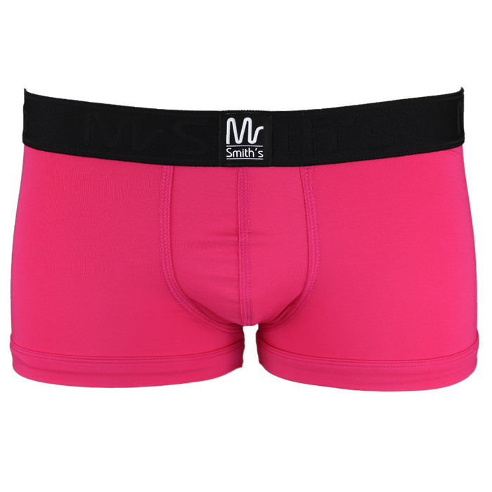 Pink boxer trunks with a black waistband on a white background