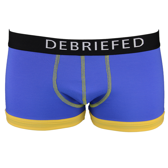 Blue boxer trunk with a black 'DEBRIEFED' waistband on a white background