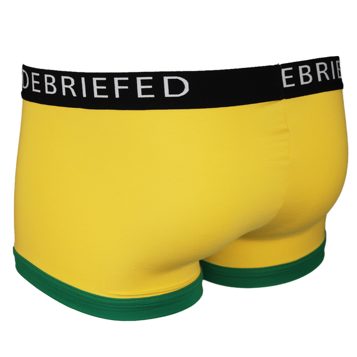 back view of yellow boxer trunks with branded waistband and green trim