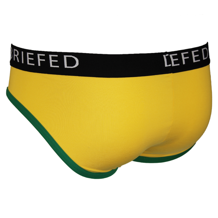 Yellow men's underwear with black waistband and green trim on a white background