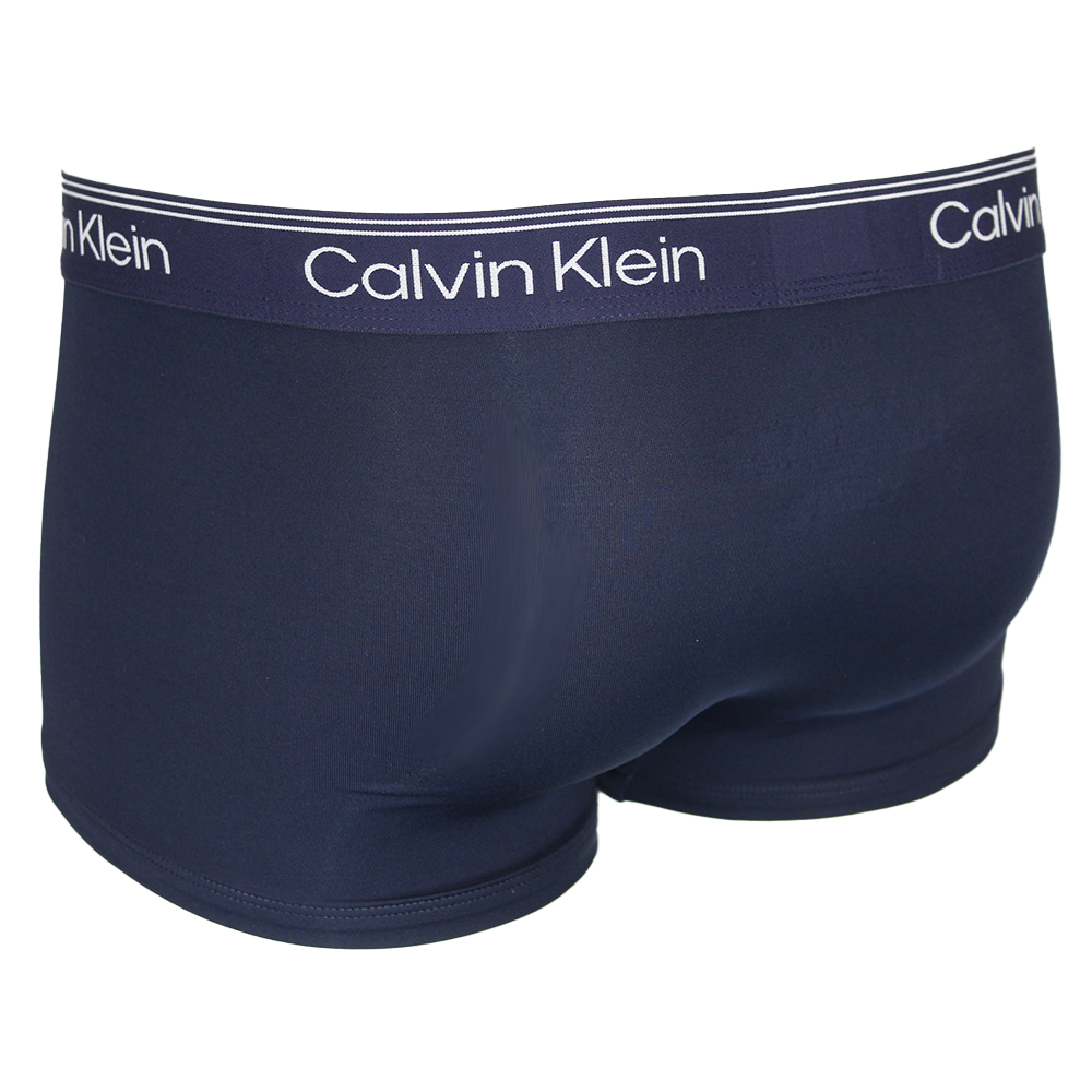 Navy Calvin Klein boxer trunk on a white background