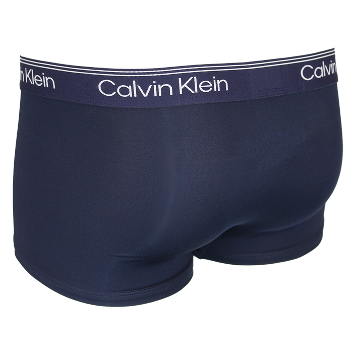 Navy Calvin Klein boxer trunk on a white background