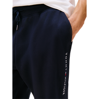 Navy blue Tommy Hilfiger sweatpants on a white background