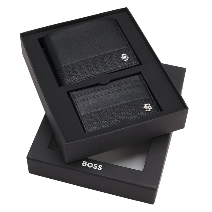 Black leather wallet and cardholder set with 'BOSS' branding in a box on a white background