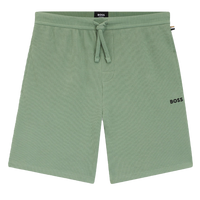 Green shorts with boss branding