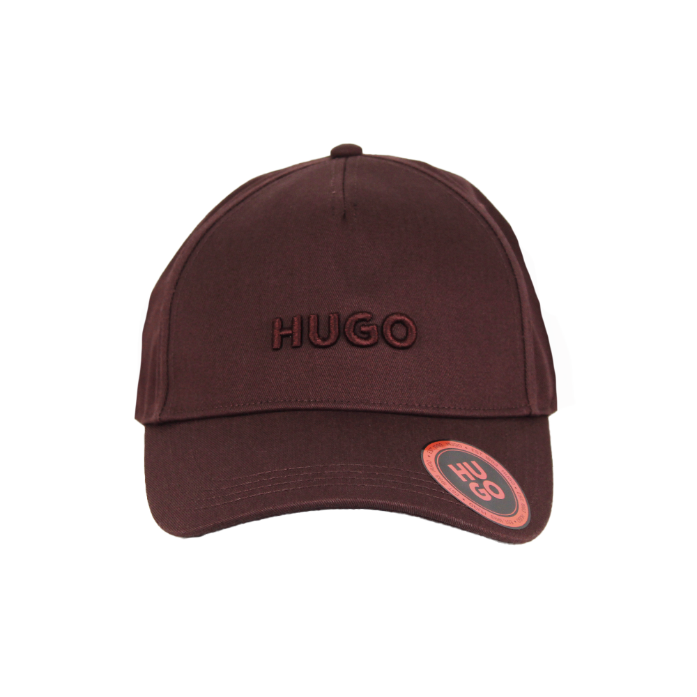 Brown cap with 'HUGO' branding on a white background