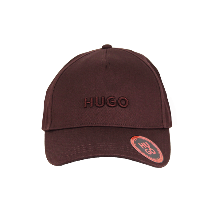 Brown cap with 'HUGO' branding on a white background