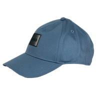 Blue baseball cap with a black patch on a white background