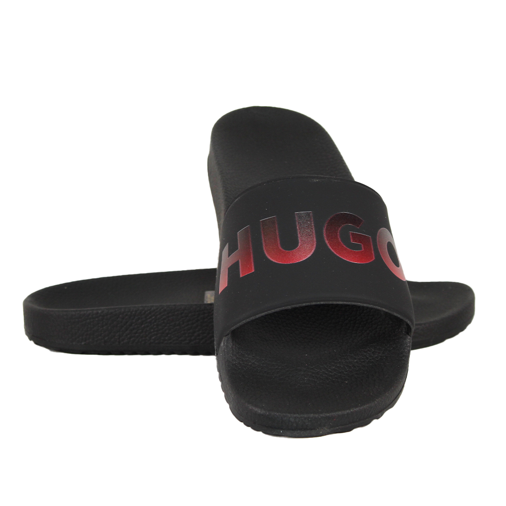 Black slide sandals with red 'HUGO' logo on a white background