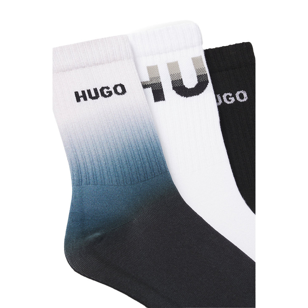 Three socks with 'HUGO' branding on a white background