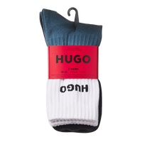 Pack of three pairs of socks with HUGO branding on a white background