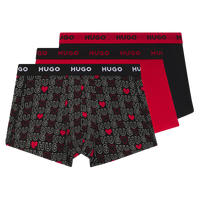 Three pairs of men's boxer trunks two plain colours, one with all over HUGO heart logos.