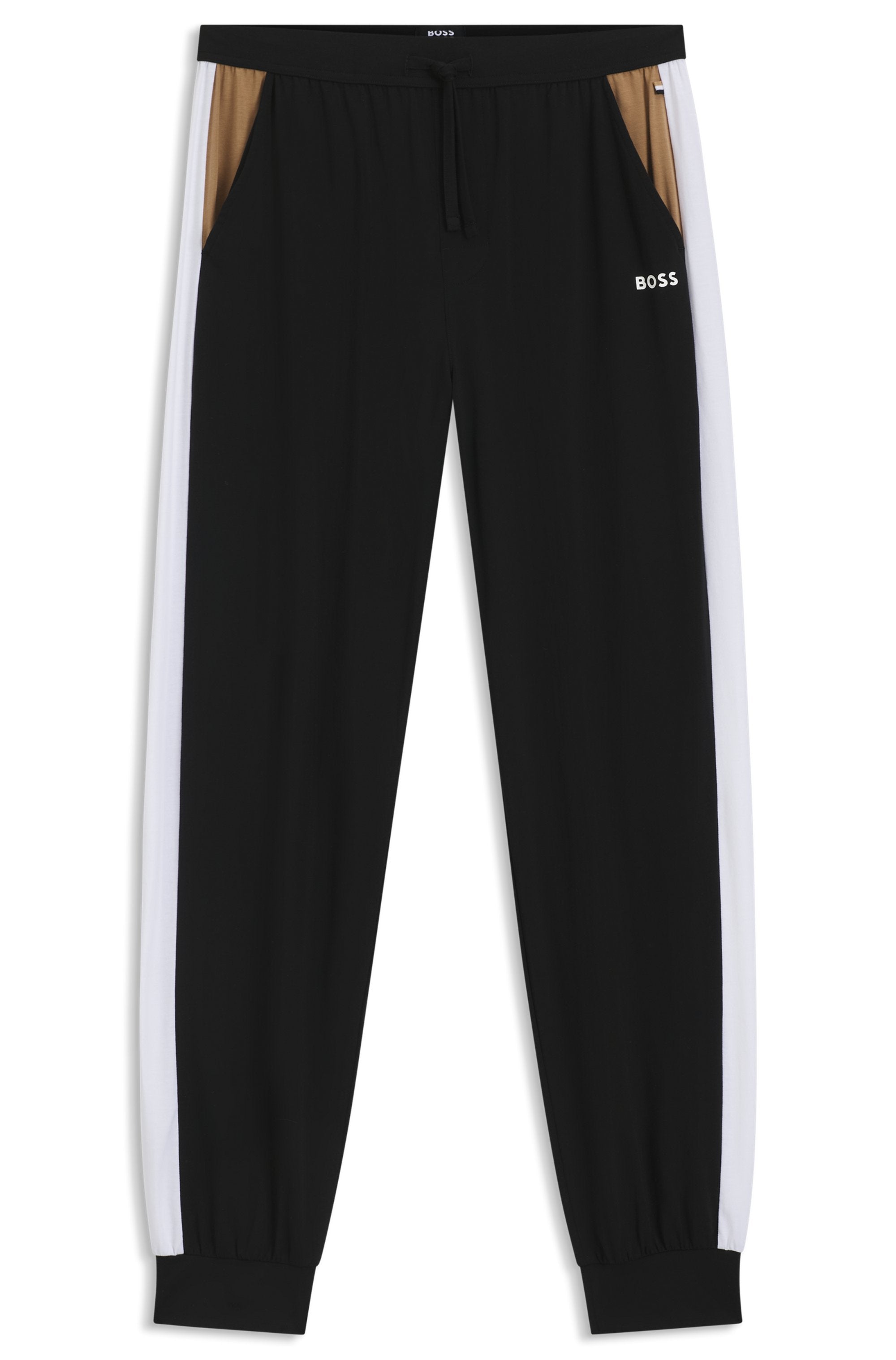 Black tracksuit pants with white side stripes on a white background